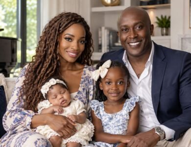 Gerald Mwangi with Shamea Morton and their two daughters in a family portrait