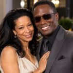 Mitzie Lau and Michael Wright posing together at a red-carpet event