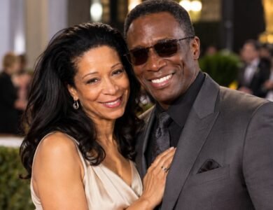 Mitzie Lau and Michael Wright posing together at a red-carpet event