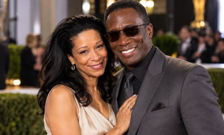 Mitzie Lau and Michael Wright posing together at a red-carpet event